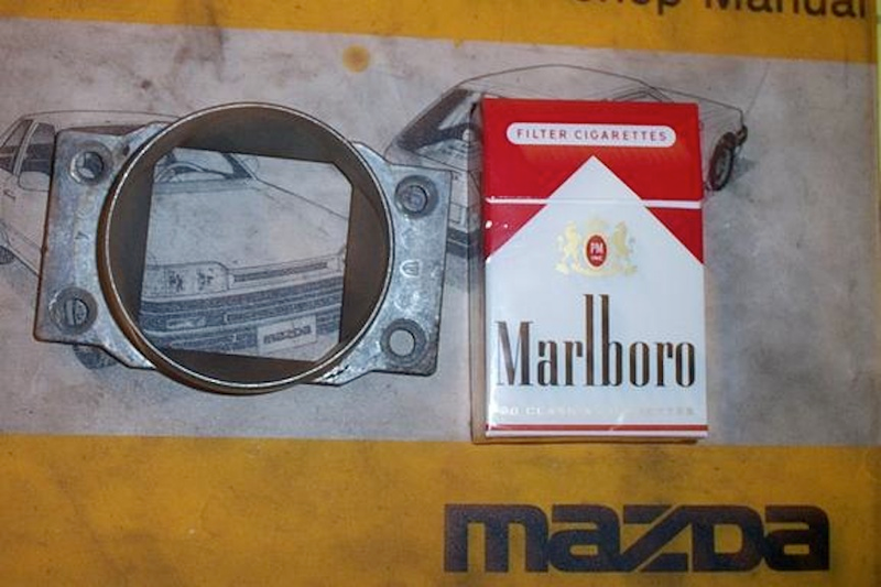 Illustration for article titled CarDomaining - "Scuderia Mazda Marlboro" Edition